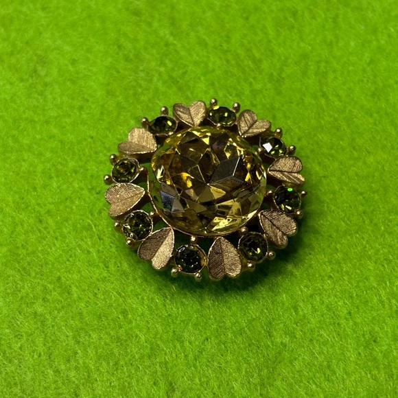 Avon Jewelry - Vintage Avon "Sun Brilliants" brooch/pendant